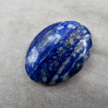 Lapis lazuli-spotted cabochon #01