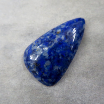 Lapis lazuli-spotted cabochon #07