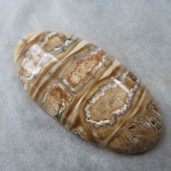 Natural mammoth tooth-stool, cabochon no.7